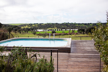 Swimming pool on a rainy day in the countryside of Portugal.