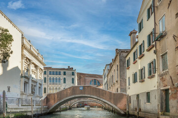 Inland canals with their bridges and old buildings are the waterways of Venice, Italy, 2019