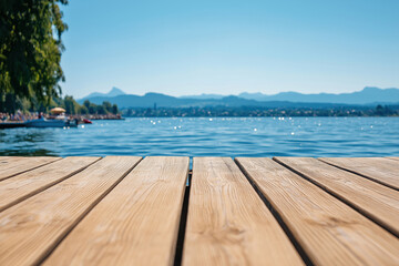 Fototapeta premium Serene lakeside dock with mountains and clear blue sky on a sunny day