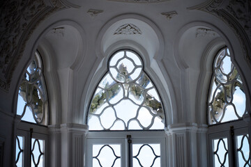 Sintra, Portugal - 09 27 2017: Detailed view of Gothic-inspired windows inside Pena Palace.