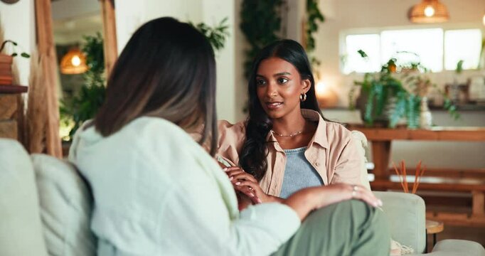 Friends, gossip and women in living room, bonding and conversation for rumor in home, morning and chat. Happy, communication and people with news in lounge, break and relax on weekend in apartment