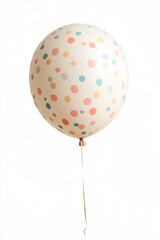 Festive balloon with colorful pastel polka dots is floating on a pure white background