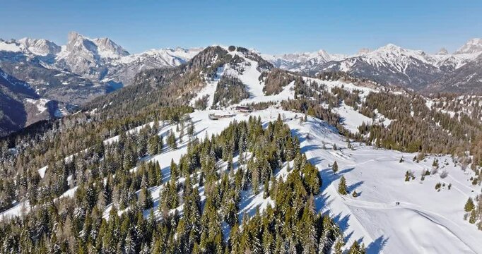 Aerial drone view of Col dei Baldi, Alleghe, in the Dolomites, Italy in daylight