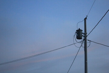 low angle view of electric pole with natural sky background