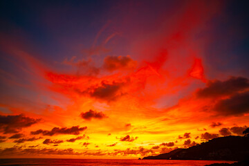 Landscape of colorful clouds in sunset or sunrise sky over sea with reflection in the tropical sea,Beautiful seascape scenery,Amazing light of nature Landscape nature background