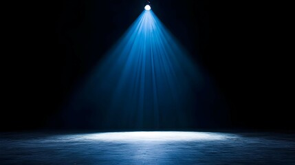 Blue Spotlight on Dark Stage