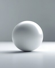 A sleek white sphere sitting on a polished surface with a gradient background, highlighting its geometric precision and minimalist aesthetic.

