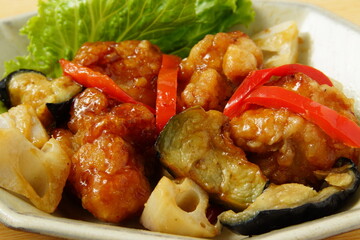 唐揚げと茄子の炒め物