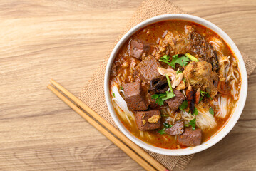Northern Thai food, Spicy rice noodles soup with pork, Local Thai food, Table top view