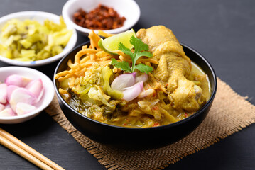 Northern Thai food (Khao Soi), Spicy curry noodles soup with chicken, Local Thai food