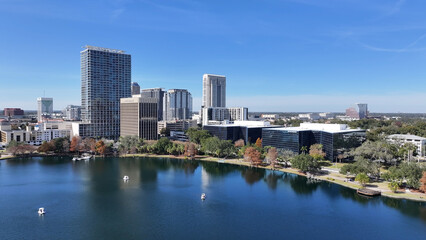 Fototapeta premium Orlando Skyline In Florida United States. Downtown City Landscape. Stunning Cityscape. Beautiful Eola Park. Orlando Skyline In Florida United States. Skyscrapers Scenery. Outdoors Skyline.