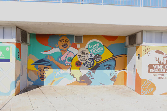 Colorful mural artwork brightens a wall at Rodney Cook Sr. Park in Atlanta. The vibrant public art features bold shapes, expressive faces, and dynamic patterns that celebrate culture and community.