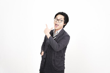 Obraz premium Shocked wow face Presenting and pointing up with forefinger on copyspace for advertising Of Handsome Asian Man Isolated On White Background