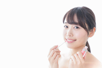 お化粧をする女性