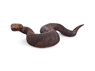 Naklejka premium A wooden snake figurine with intricate carvings, isolated on a white background