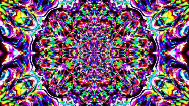 Psychedelic kaleidoscope pattern with vibrant colors, viewed from a top-down angle, resembling a trippy video effect with swirling, mirrored designs.