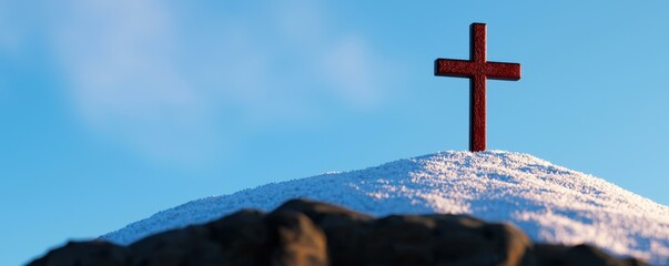 Red Cross Silhouette Against a Snowy Hill Under a Clear Blue Sky Symbolizing Faith and Sacrifice