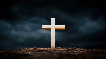 White Cross Silhouette Against Dark Dramatic Sky Symbolic Representation of Christian Faith and Belief