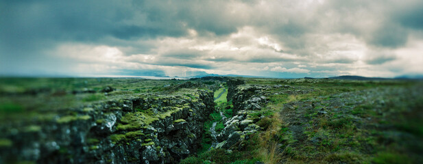 Panoramic pathway through the rift valley that marks  the Mid-Atlantic Ridge and the boundary between the North American tectonic plate and the Eurasian inside of Thingvellir National Park, Iceland.