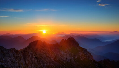 Fototapeta premium breathtaking sunrise over mountain range, symbolizing new beginnings and potential