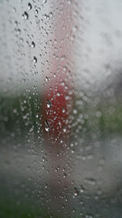 Raindrops on the glass, focus selected