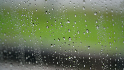 Raindrops on the glass, focus selected