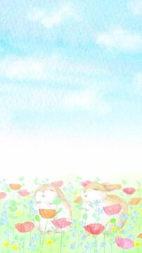 春の花畑で空を見上げる二匹の子うさぎの縦型ループアニメーション。水彩画を使用したカラフルで可愛い映像。