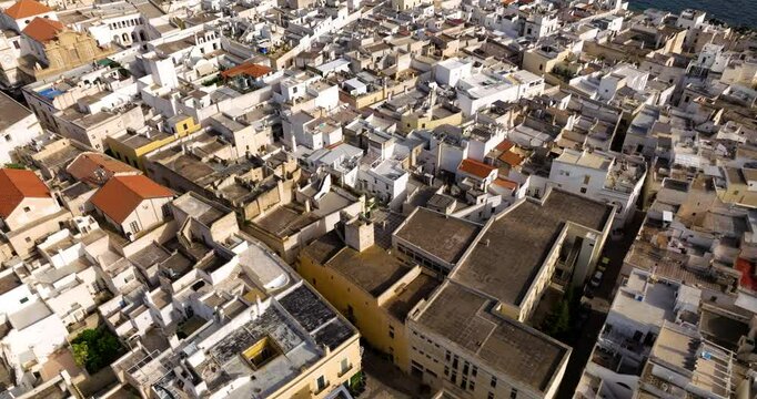 Dense Buildings Over Gallipoli Coastal Town In Apulia, Southern Italy. Aerial Drone Shot