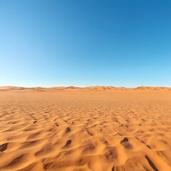 Vast Desert Landscape with Golden Sand Dunes and Clear Blue Sky in a Remote Location