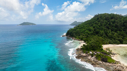 Fototapeta premium Sandy shores on tropical islands and clear turquoise seas. Seychelles, Mahe.