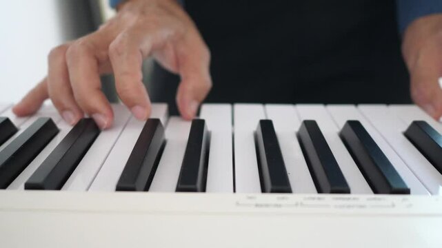 Close-Up of Musician&rsquo;s Fingers Playing a Keyboard &ndash; Music Performance and Creativity Concept