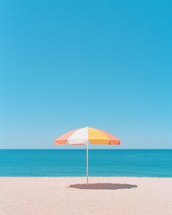 Relaxing beach scene with colorful umbrella coastal area clear sky wide angle serenity