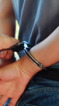 Police arresting man