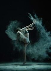 Dynamic dancer creating patterns with dust in an artistic performance