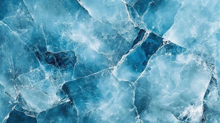 Fototapeta premium Beautiful winter natural blue ice texture of surface of frozen. Nature abstract pattern of white cracks. Winter seasonal background, mock up, flat lay, ice texture background