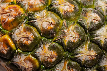 Close up macro photo of fresh pineapple pattern skin