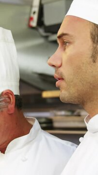 Three chefs discussing