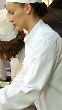 Team of chef cleaning the kitchen