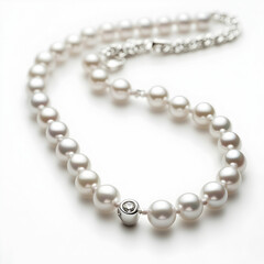 A pearl necklace gracefully displayed on a clean white background