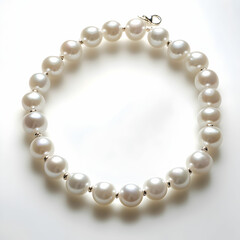 Fototapeta premium A pearl necklace gracefully displayed on a clean white background