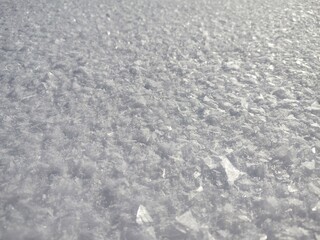 white, beautiful, bright, shiny, glowing, snow flakes against the background of a field on a frosty, cold, fresh, sunny, clear day