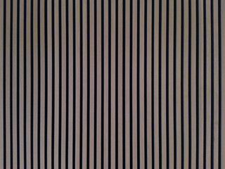 A background with lots of vertical and gray stripes. Striped wooden texture.