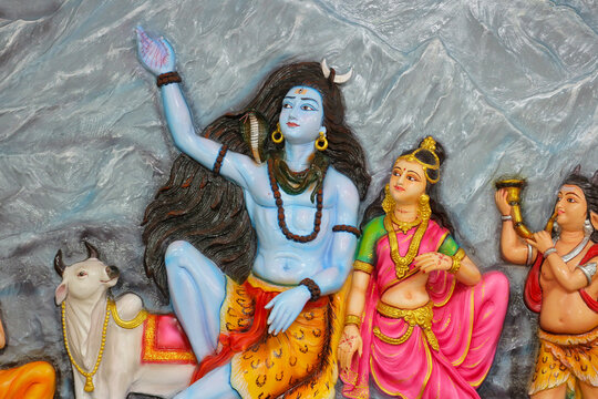 Shiva, Parvati and the bull Nandi. Fragment of decoration on the temple wall.