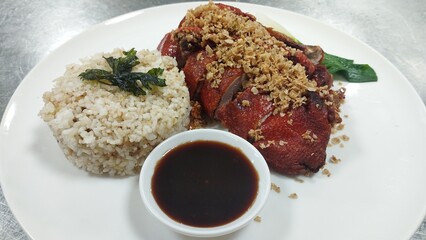 Golden Peking Duck Served with Fragrant Garlic Rice and Hoisin Glaze