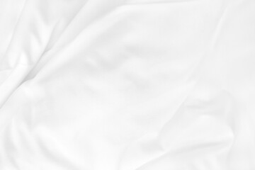 Close up top view of white bedding sheet and wrinkle messy blanket in bedroom after wake up in the...