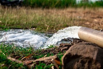 pump pipe water flow equipment agriculture, pump pipe water flow equipment agriculture, Water from a well filled a pond for irrigation,Irrigation water from the source