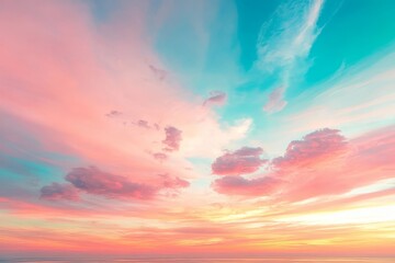 Obraz premium Beautiful sunset sky with blue and pink clouds, gradient sky, panoramic view, wide-angle low-angle shot, soft light, bright colors, high resolution.