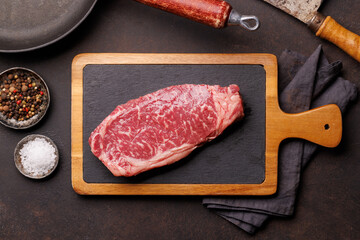 Raw marbled striploin steak, fresh, rich, ready for cooking