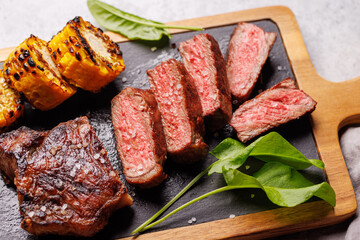 A perfectly cooked sliced striploin steak with a juicy, tender texture