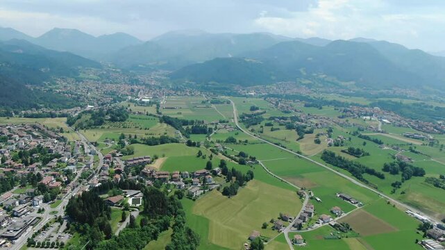 Rovetta and plateau of Clusone landscape, Italy. Aerial forward and panoramic view
